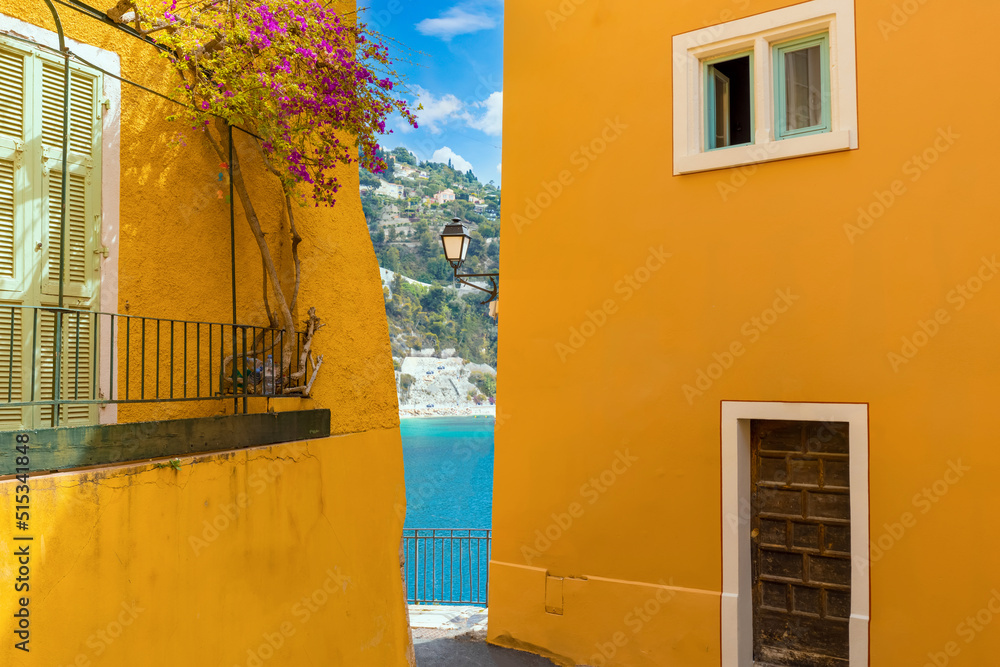France, French Riviera, Villefranche old city streets in historic city center near sea promenade.