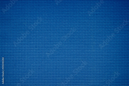 Closeup of blue fabric texture for background used. Pattern blue dark denim, linen, natural cotton satin textile textured.