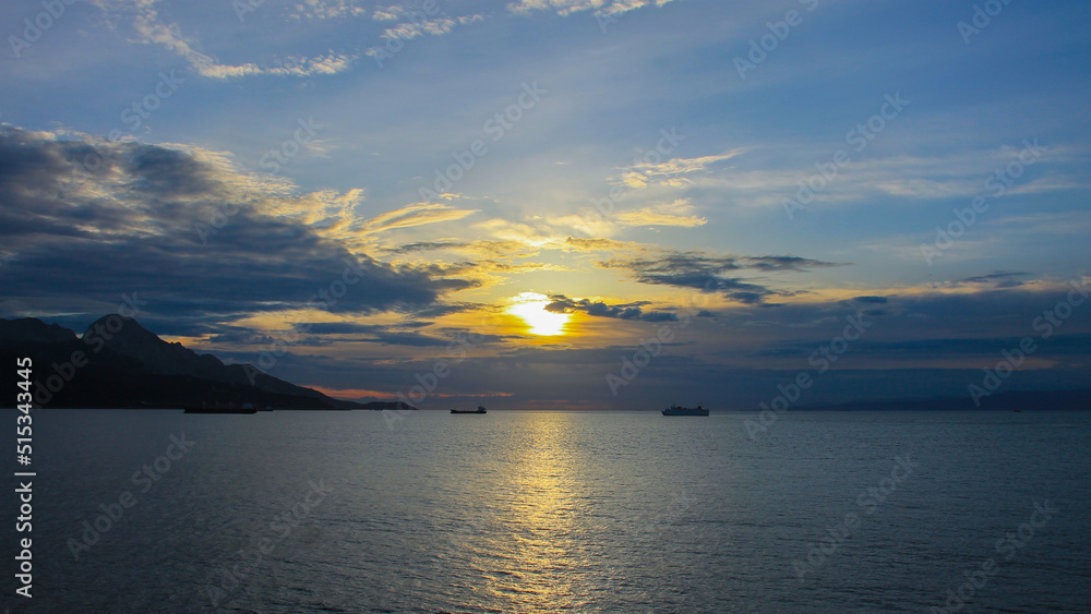 Sunset between two continents Africa and Europe, between two countries Morocco and Spain, in the mediterranean sea. Sunset between two continents Africa and Europe, between two countries Morocco and Spain, in the mediterranean sea.