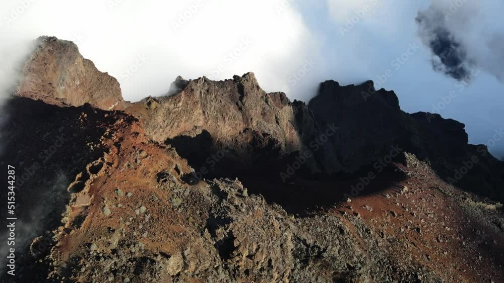 Drone footage of the mountains of the Piton des Neiges summit at the