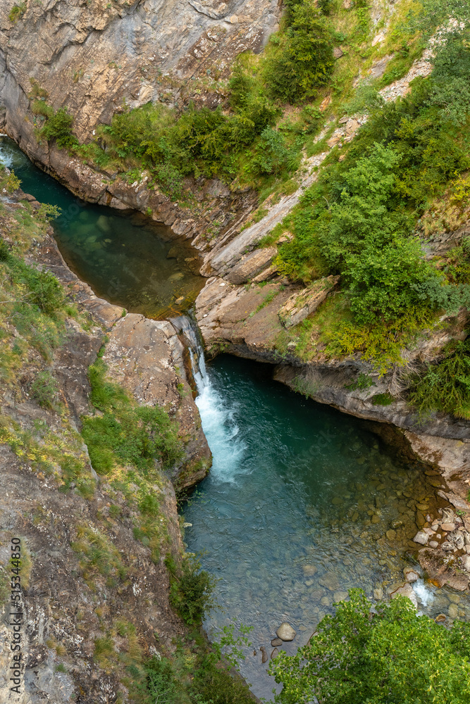 Views of the river from the metal walkway on the mountain in the town of Panticosa in the Pyrenees Views of the river from the metal walkway on the mountain in the town of Panticosa in the Pyrenees