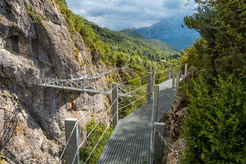 Footpath of the metal footbridge in the mountain in the town of Panticosa in the Pyrenees, Huesca photo