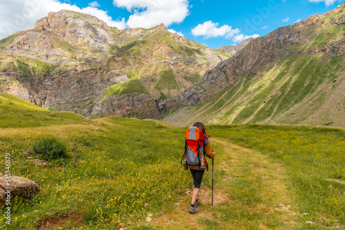 A young woman on mountain trekking with her son in the Ripera valley, Pyrenees mountains © unai