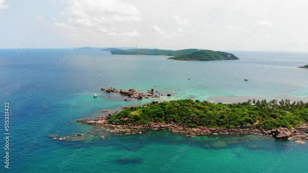 Beautiful Aerial Colorful Paradise Landscape View of Rocky Coast, Phu Quoc island, Vietnam, Surrounded by Clear Turquoise Sea, Lands and islands of the Archipel in Horizon Beautiful Aerial Colorful Paradise Landscape View of Rocky Coast, Phu Quoc island, Vietnam, Surrounded by Clear Turquoise Sea, Lands and islands of the Archipel in Horizon