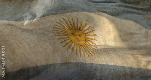 Old Argentina Flag waving at wind photo
