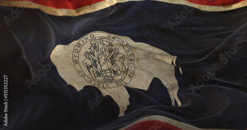 Fotografía Old Wyoming State Flag waving at wind