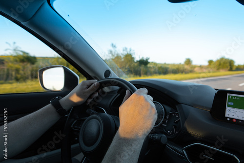 man hands on steering wheel car driving © phpetrunina14