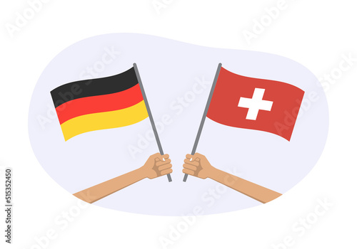 Germany and Switzerland flags. Canadian and Swiss national symbols. Hand holding waving flag. Vector illustration.