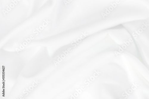 Smooth elegant white silk or elegant satin texture can be used as background. © sai