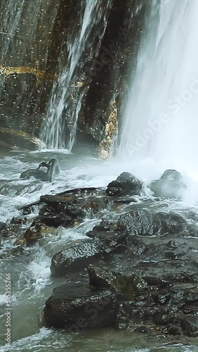 Wallpaper Mural Nature, waterfall pond, water falling on the rocks, lock down shot, vertical video Torontodigital.ca