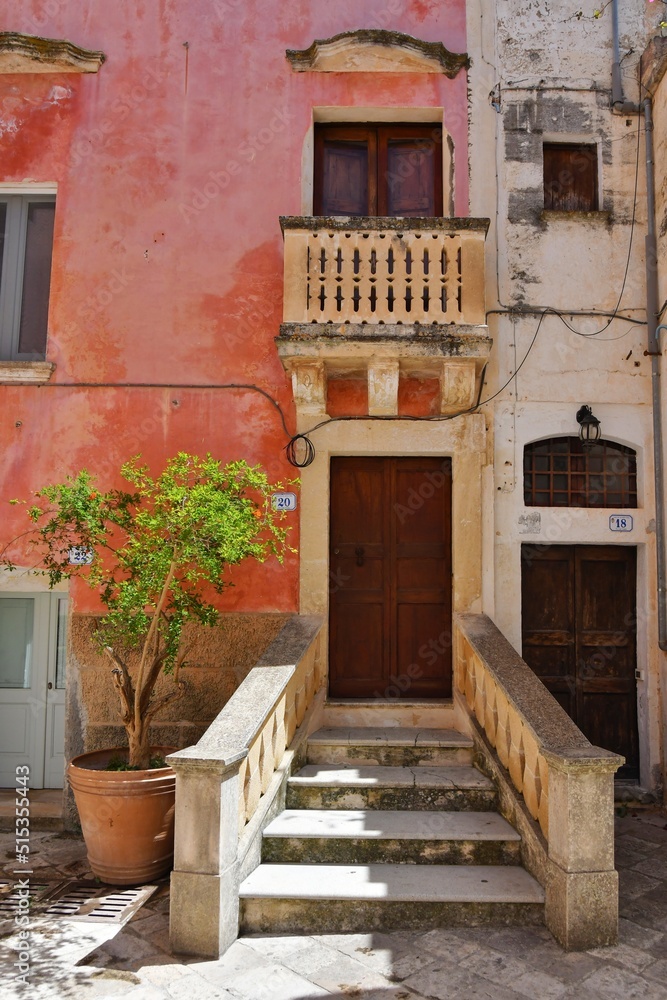 The facade of a characteristic house in Specchia, a medieval town in the Puglia region of Italy.