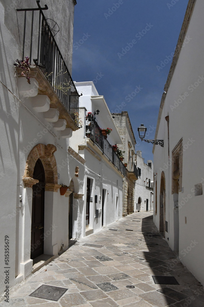 A street in the historic center of Specchia, a medieval town in the Puglia region, Italy.