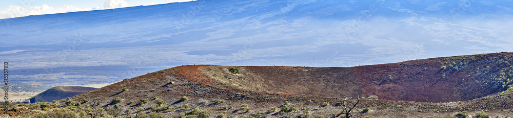Panoramic view of mountain landscape in Hawaii, USA with a background of blue sky and copyspace. Open field of nature and ecological life near the worlds largest active volcano on earth
