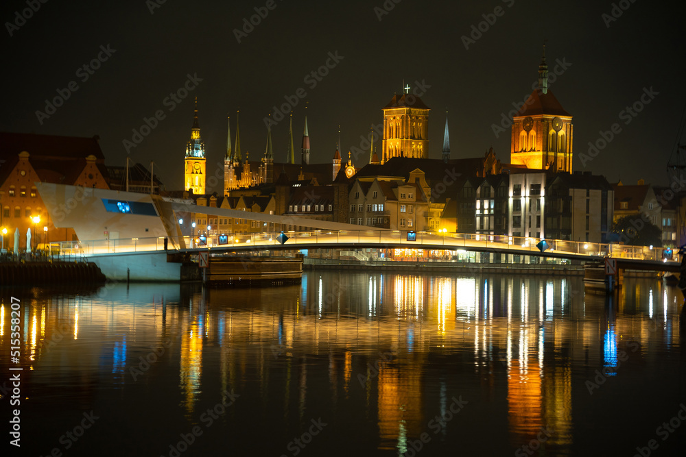Fototapeta premium Picturesque summer evening panorama of the architectural pier of the Old Town GDANSK, POLAND
