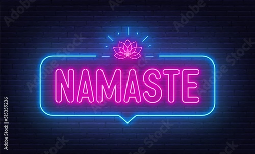 Namaste neon sign in the speech bubble on black background.