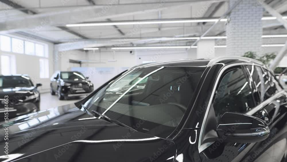 Showroom for sale or rental of prestigious SUVs. Warehouse parking lot with mileage Showroom for sale or rental of prestigious SUVs. Warehouse parking lot with mileage