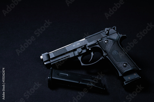 beretta pistol with tactical vest