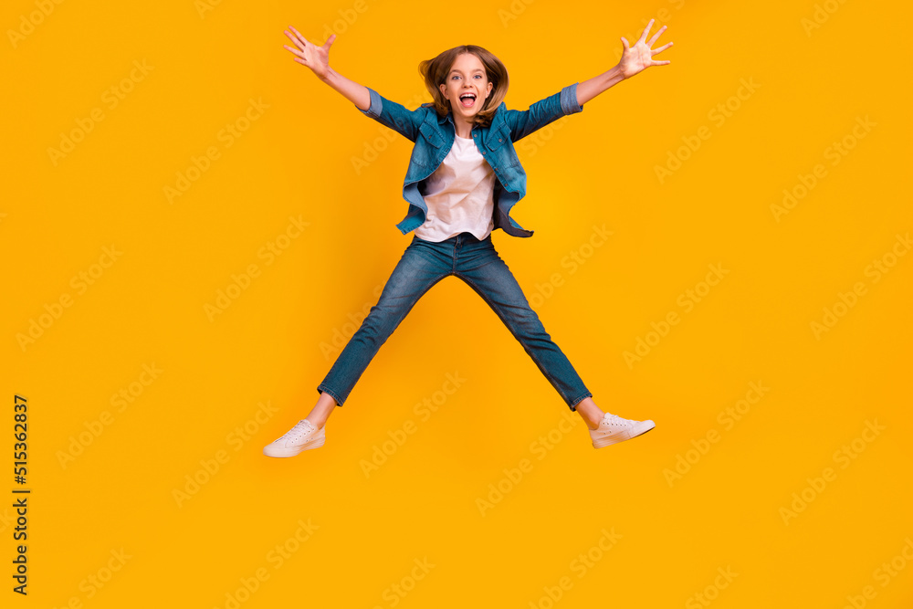 Obraz premium Full body photo of overjoyed satisfied person jumping raise opened arms falling isolated on yellow color background