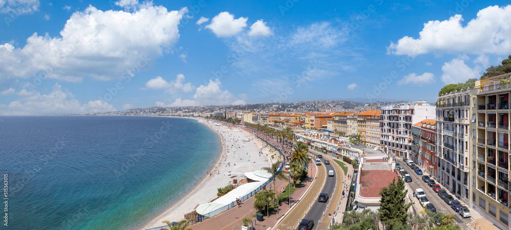 France, panoramic skyline of old historic Nice center and azure beaches along Promenade des Anglais.