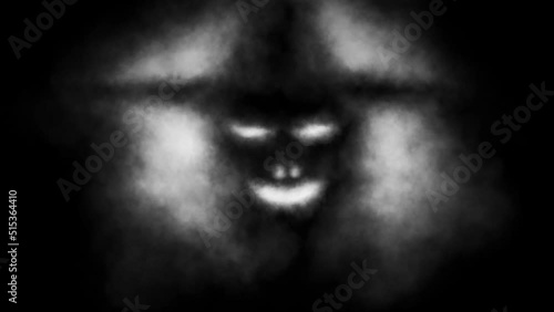 Dark scarecrow in hat. Luminous mouth and eyes. Scary 2D animation. Horror fantasy theme movie. Abstract motion graphics. Music clips and VJ loops. Black and white horror video for Halloween. photo