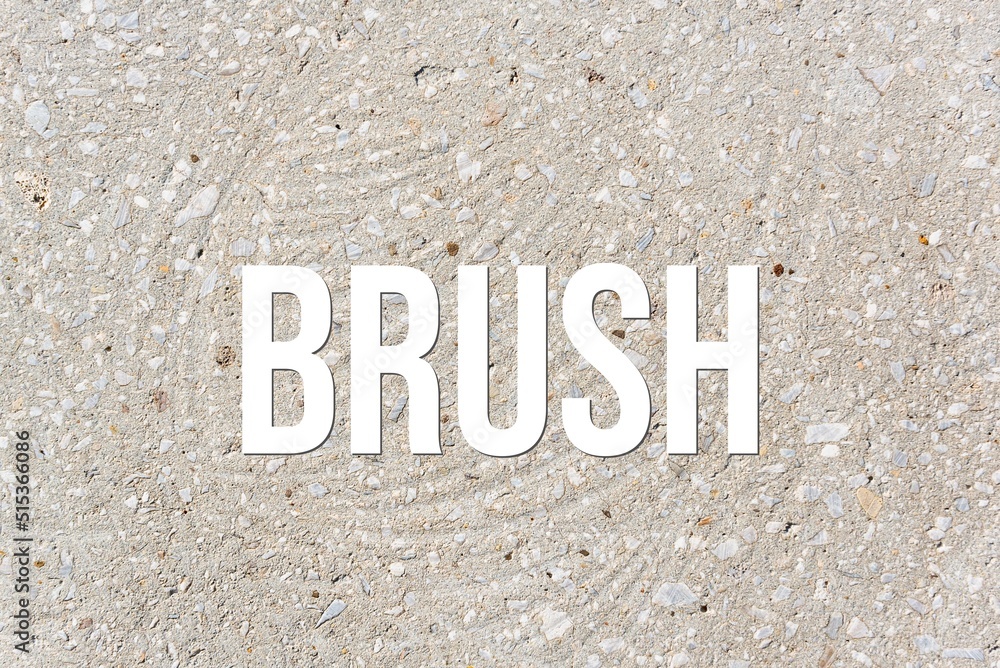 BRUSH - word on concrete background. Cement floor, wall. BRUSH - word on concrete background. Cement floor, wall.