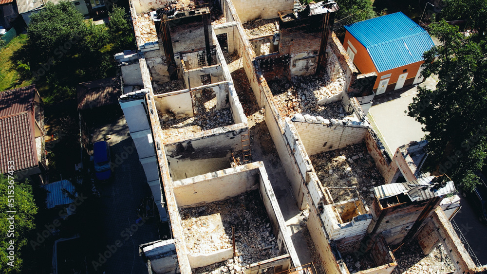 a house in Irpen destroyed by shells of Russian occupiers, drone view a house in Irpen destroyed by shells of Russian occupiers, drone view