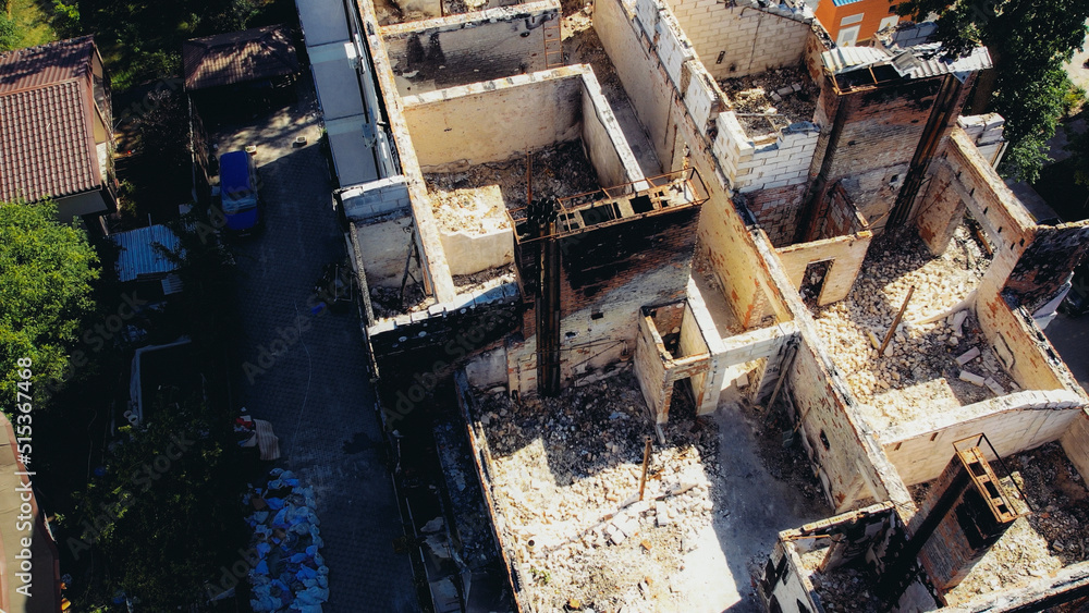 a house in Irpen destroyed by shells of Russian occupiers, drone view