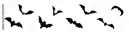 Silhouettes of bats on a white background