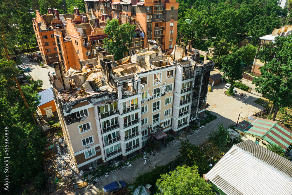 Fototapeta premium a house in Irpen destroyed by shells of Russian occupiers, drone view