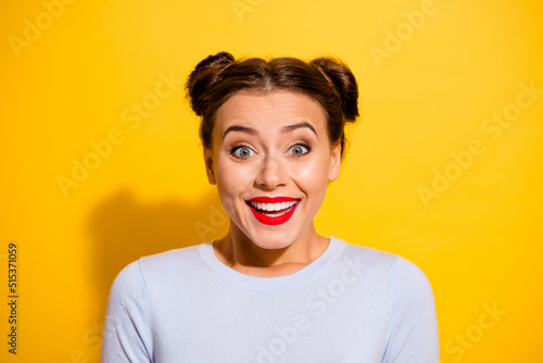 Photo of funky good mood female laughing showing her new white teeth isolated on yellow color background