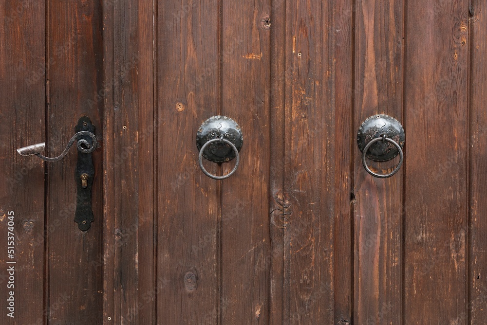 Wooden craft brown surface of the door as a comfortable background for the vintage photo picture with different structures. High quality vertical photo . Wooden craft brown surface of the door as a comfortable background for the vintage photo picture with different structures. High quality vertical photo .