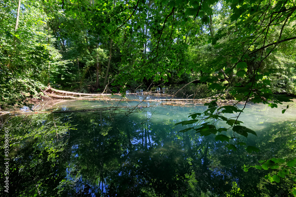 Blue waters of Tavers village in the Loire valley Blue waters of Tavers village in the Loire valley