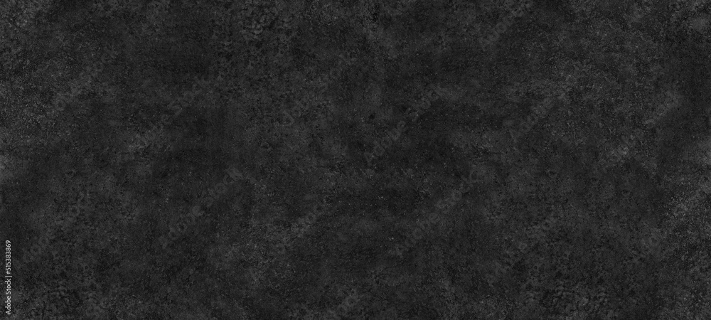 Fine textured shabby black surface wide abstract background. Dark gray spotty grainy texture. Gloomy grunge widescreen wallpaper
