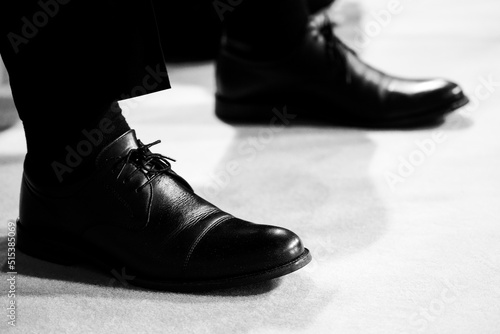 detail of black, men's shoes. photo inside.