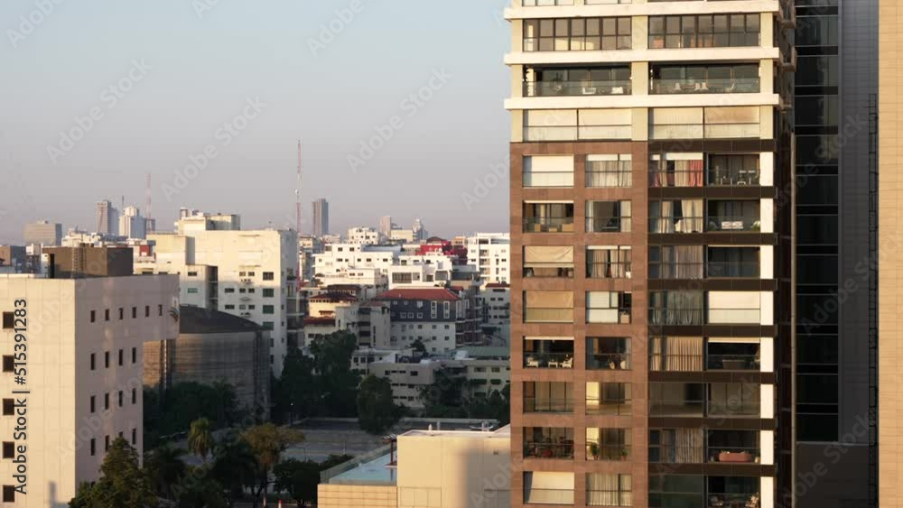 Close-up of residential building in downtown of Santo Domingo in soft evening light, Dominican Republic. Static shot