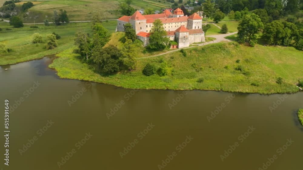 Ukrainian ancient Svirzh castle in sunny day. Filmed in UHD 4k video. Ukrainian ancient Svirzh castle in sunny day. Filmed in UHD 4k video.
