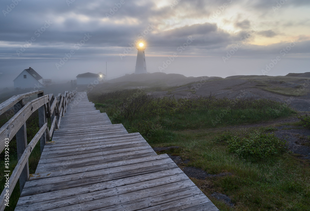 Cape Spear lighthouse and walkway in the morning fog