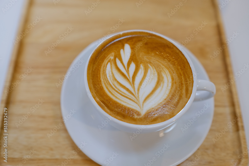 hot latte art coffee on wood table, relax time
hot latte art coffee on wood table, relax time