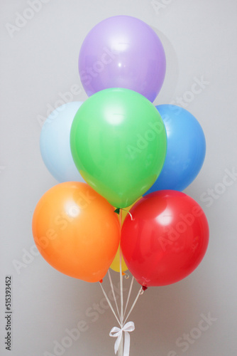red and yellow balloons on white background