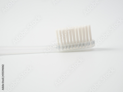 Toothbrush with copy space on white background.
