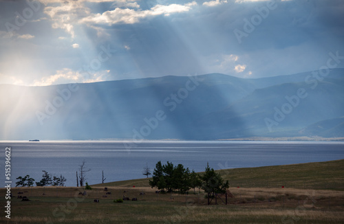 Sun beams above Baikal lake on Olkhon island near Khuzir