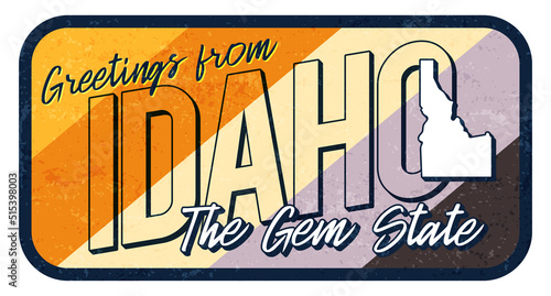 Greeting from Idaho vintage rusty metal sign vector illustration. Vector state map in grunge style with Typography hand drawn lettering