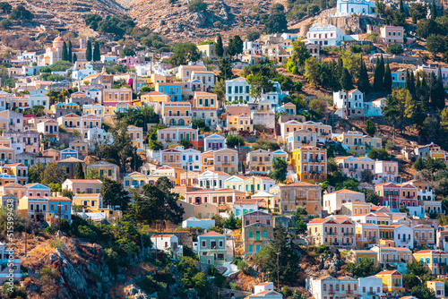 View of traditional colorful houses on Symi island, Greece, Dodecanese © LALSSTOCK