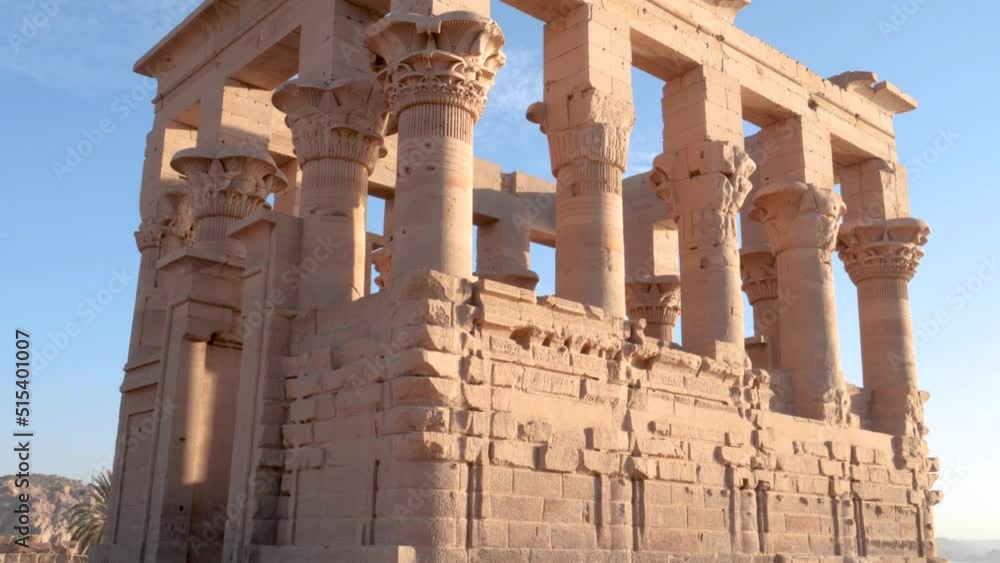 Narrow view of preserved ruins in ancient temple of Philae in Aswan, Egypt. Narrow view of preserved ruins in ancient temple of Philae in Aswan, Egypt.