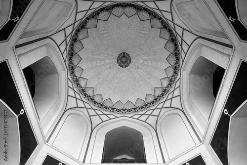 Black and white low angle interior architecture photograph of a vintage historical building with beautiful patterns and shapes