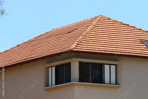 Red tiled roof on a residential building in Israel