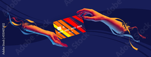 Contemporary art collage. Modern colorful design with credit card on human hand isolated on dark blue background photo