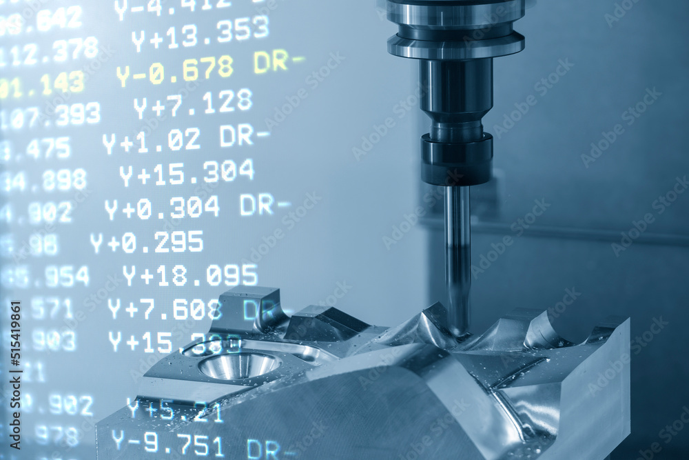 The abstract scene of CNC milling machine and the G-code data back ground with ball end mill tool. The abstract scene of CNC milling machine and the G-code data back ground with ball end mill tool.