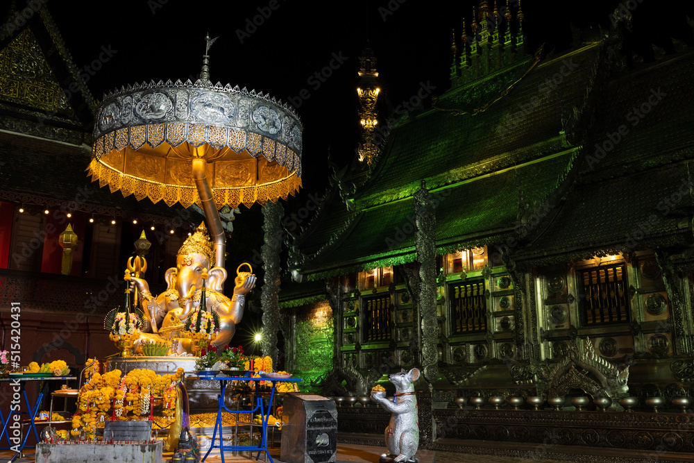 Illuminated Ganesha and Buddhist silver temple