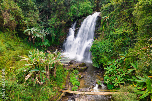 Aerial shot of a jungle waterfall